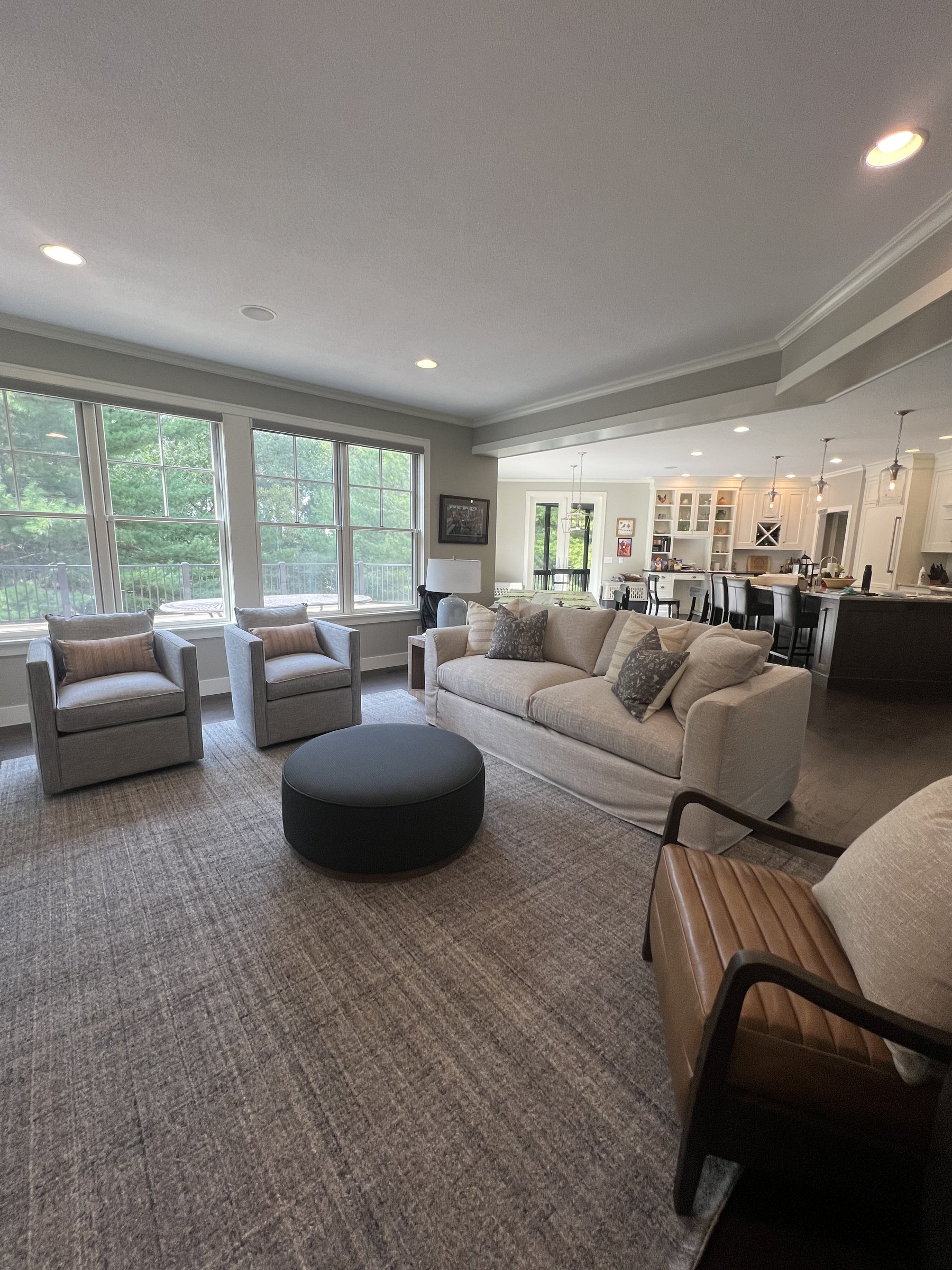 Living room with dark stacked stone fireplace